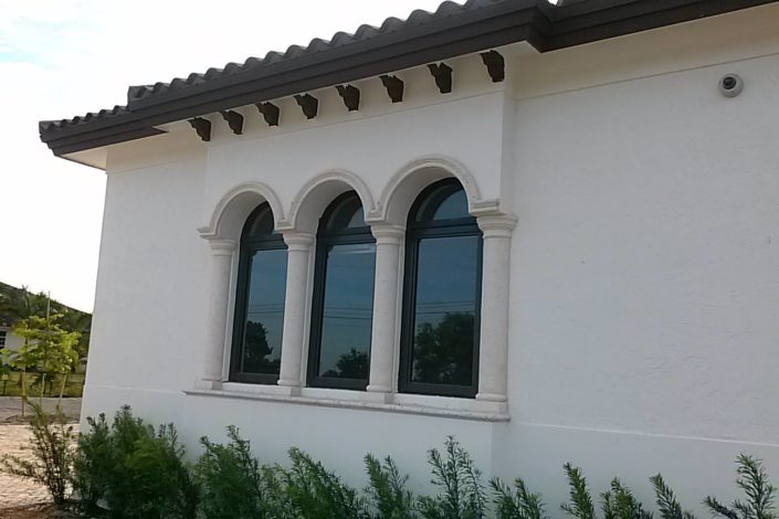 Mediterranean arched impact windows